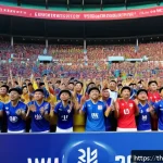스포츠마케팅에서의 혁신적인 아이디어 사례 - A vibrant stadium scene showcasing Thai football fans wearing colorful team jerseys and scarves, eng...